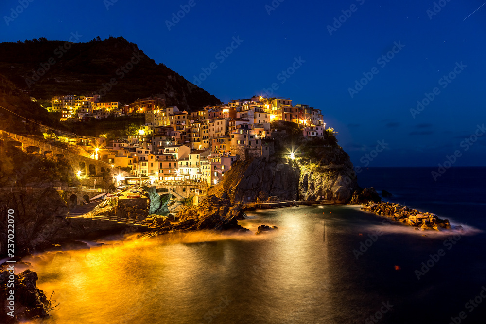 Manarola Village in Cinque Terre at evening time. Long exposure photo.