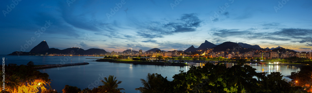 Beautiful panoramic view of the city of Rio de Janeiro with sugar loaf and corcovado at dusk.