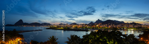 Beautiful panoramic view of the city of Rio de Janeiro with sugar loaf and corcovado at dusk.