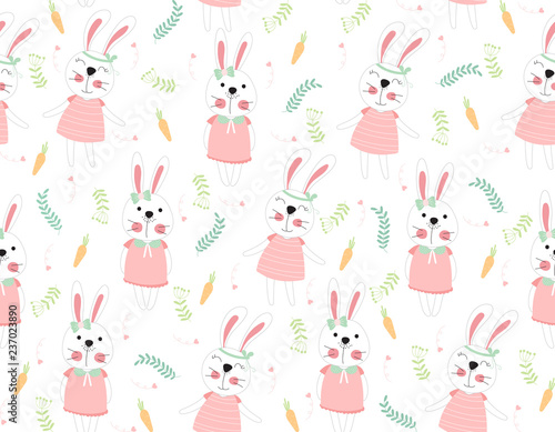 Cute rabbit cartoon seamless pattern animal with carrots and leaf on white color background.vector,illustration. © Thitichaya