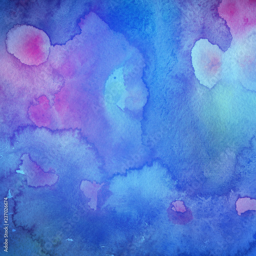 Colorful watercolor texture with abstract washes and brush strokes on the white paper background. 