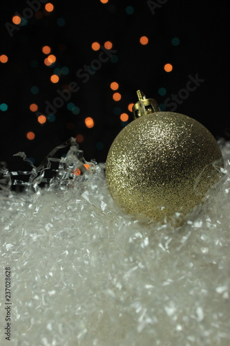 Warm Christmas background with decoraions on the gold tones photo