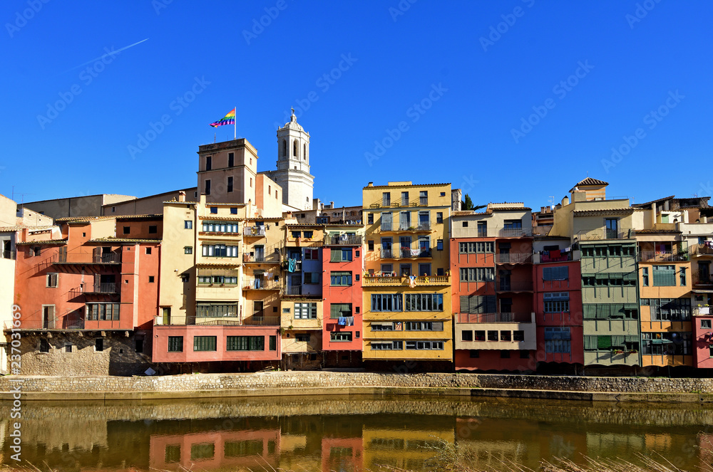 colorful houses facing the river Onyar and Catathedral, Girona, Catalonia, Spain