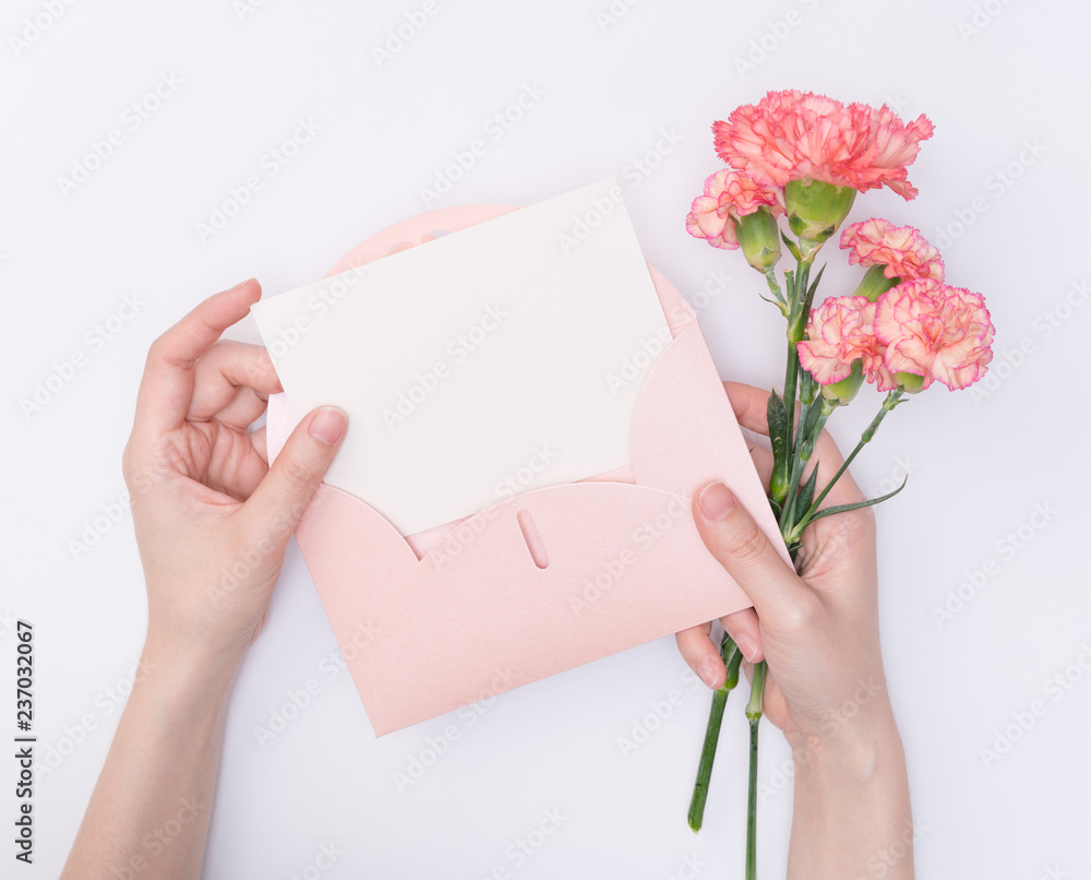 female hand hold flower with letter female hand hold flower with letter