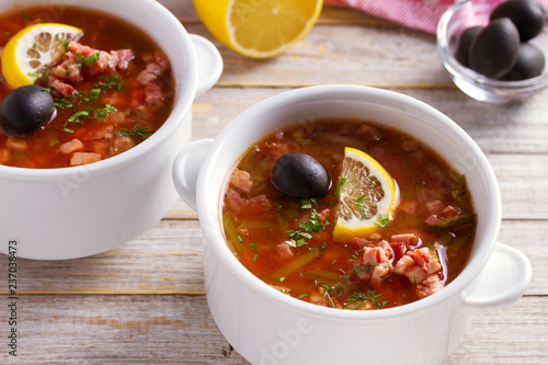 Traditional Russian dish solyanka - thick, spicy and sour saltwort soup