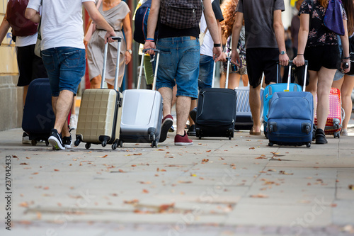 Fototapeta People with suitcases