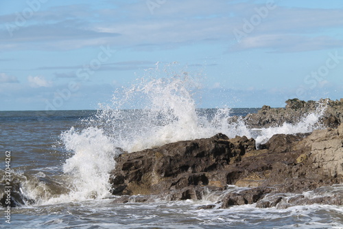 Waves in the Sea Breaking Over a Rocky Coastline.