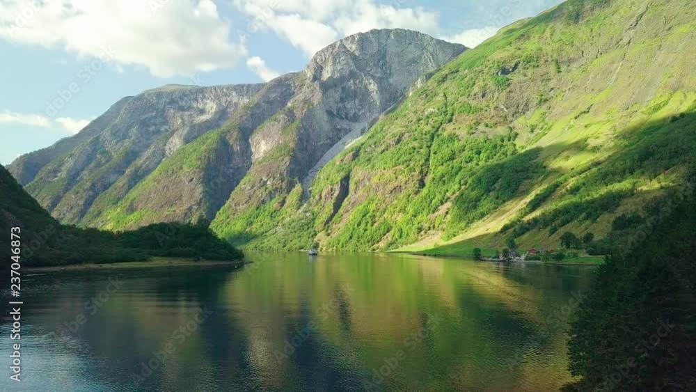 mountain waterfall and river landscape Norway, in summer sunny day with blue sky mountain waterfall and river landscape Norway, in summer sunny day with blue sky