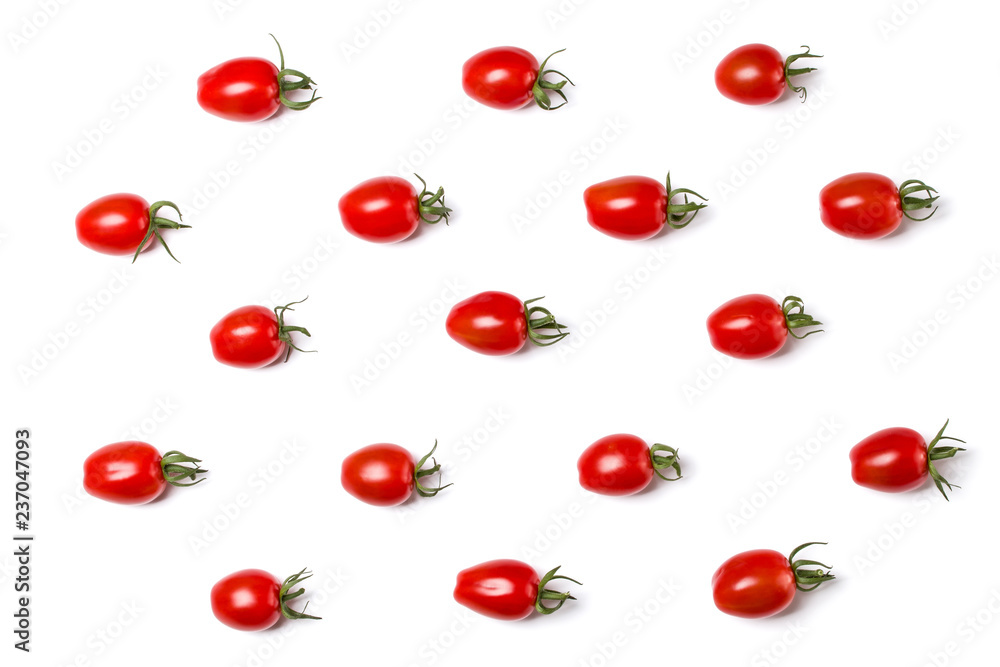 Food pattern of cherry tomato isolated on yellow background. Flat lay, top view. Food pattern of cherry tomato isolated on yellow background. Flat lay, top view.
