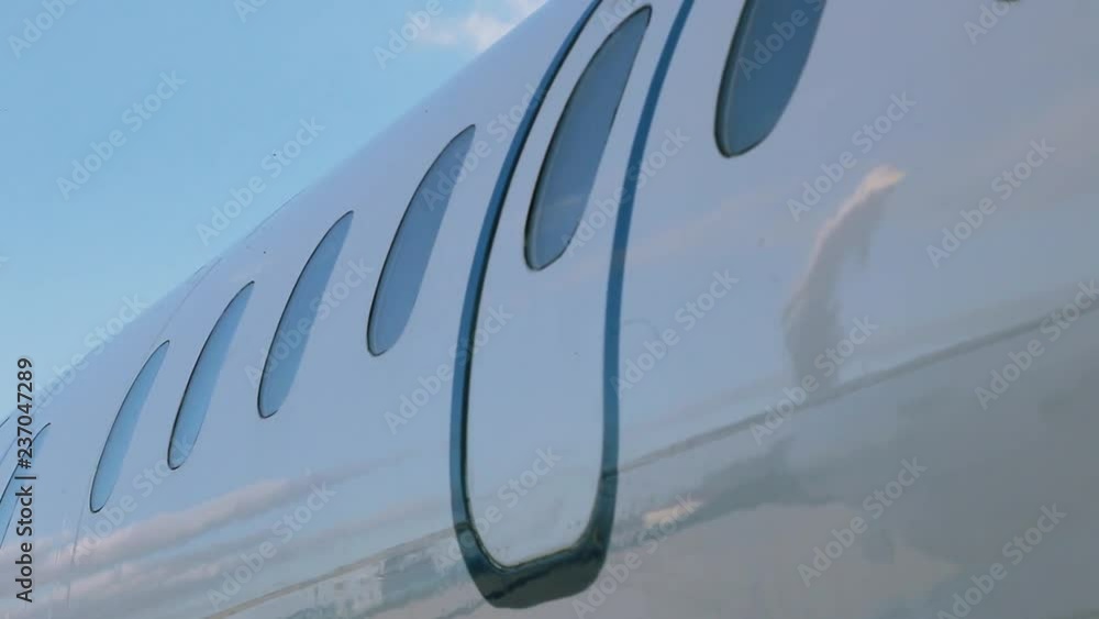 Close up plane on the airfield arrival aviation flight aerial clouds travel air airplane fly blue sky transportation transport wing trip airport airliner Close up plane on the airfield arrival aviation flight aerial clouds travel air airplane fly blue sky transportation transport wing trip airport airliner