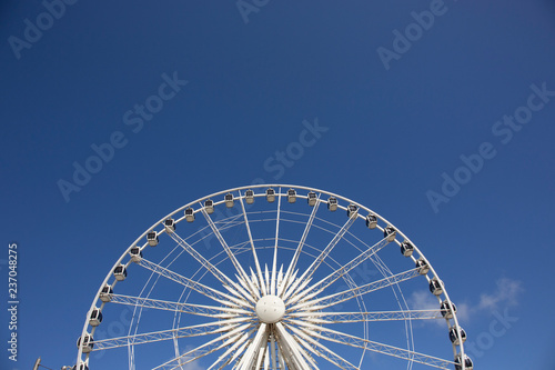 Shot with the sun still low in the sky it gives the Liverpool Ferris Wheel a white and gold glow which looks really cool