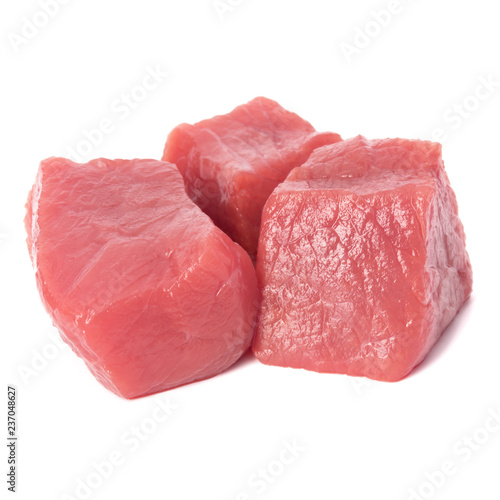 Raw chopped beef meat pieces isolated om white background cut out.