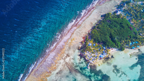 Aerial view of tropical island at Glover s Reef Atoll in Belize Barrier Reef