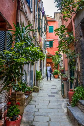beach streets and colorful houses on the hill in Vernazza in Cinque Terre in Italy  © tmag