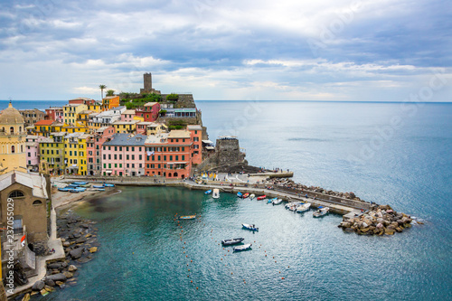 beach streets and colorful houses on the hill in Vernazza in Cinque Terre in Italy 