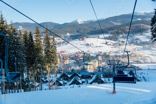 View from ski lift at winter ski resort in the mountains on a sunny morning nature calamity peace travel tourism concept