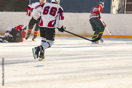 ice hockey match, players of both teams compete on the championship f