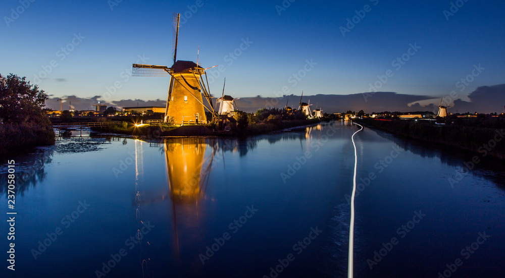 A boat passes at Kinderdijk