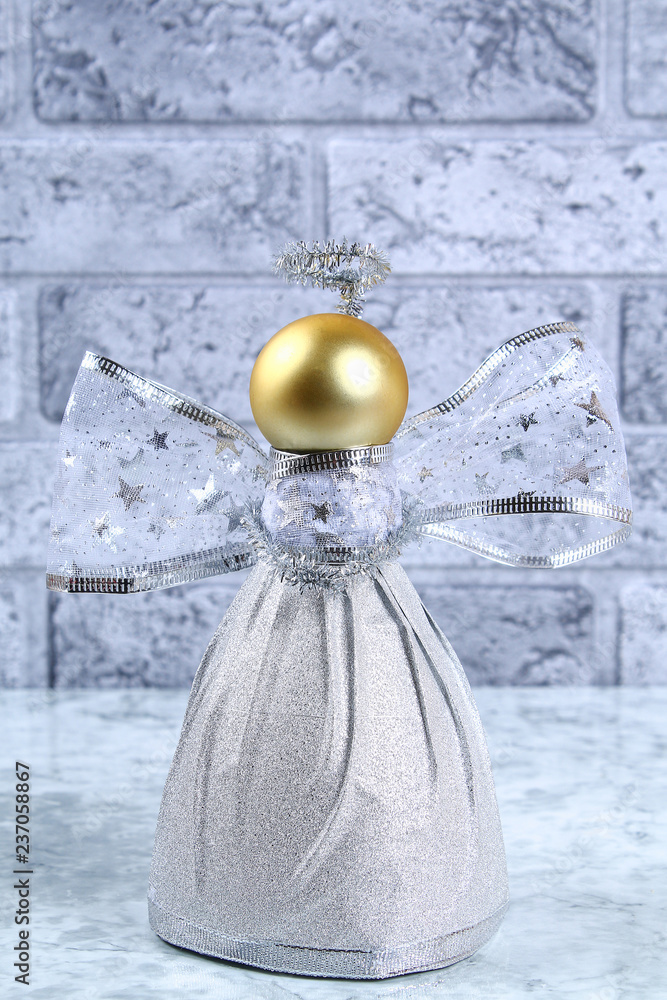 Diy Angel plastic bottle. Guide on the photo how to make a decorative angel from a bottle, self-adhesive shiny paper, ribbon and a Christmas ball with your own hands. Handmade. Step by step.