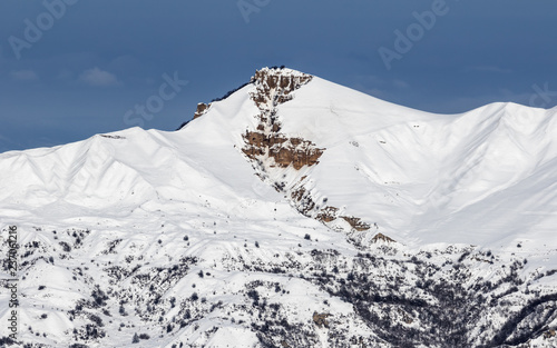 Snow winter mountains at nice sun evening photo