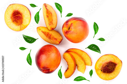 ripe nectarine with leaves isolated on white background with copy space for your text. Top view. Flat lay pattern