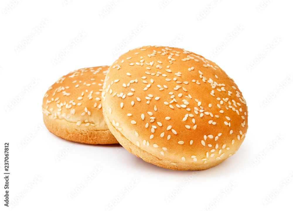 Two Hamburger buns with sesame isolated on white background