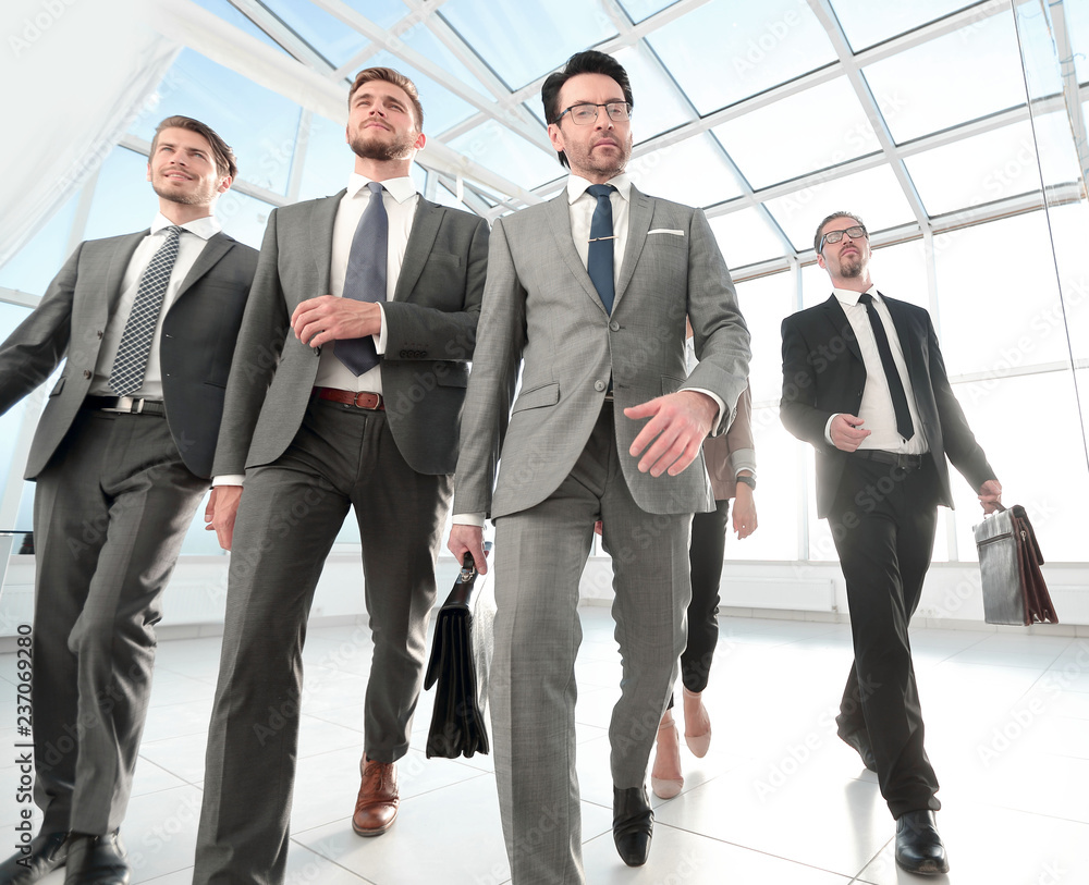 business team, walking at modern office interior business team, walking at modern office interior