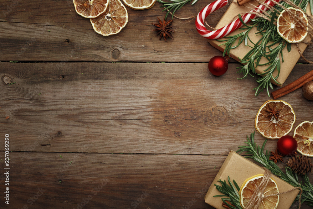 Christmas composition in rustic style on a wooden table. Top view. Christmas composition in rustic style on a wooden table. Top view.
