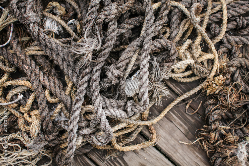 Boat Rope Textured close up. Top view of old vintage ropes on wooden background.
