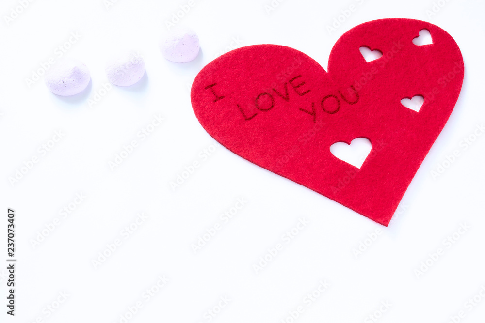 scattered red hearts on a white background. Excellent background to the day of Saint Valentine.copy space scattered red hearts on a white background. Excellent background to the day of Saint Valentine.copy space