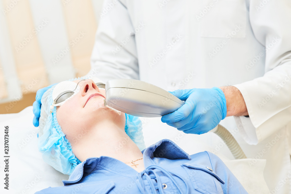 Beauty procedure. Doctor making facial skin care Beauty procedure. Doctor making facial skin care
