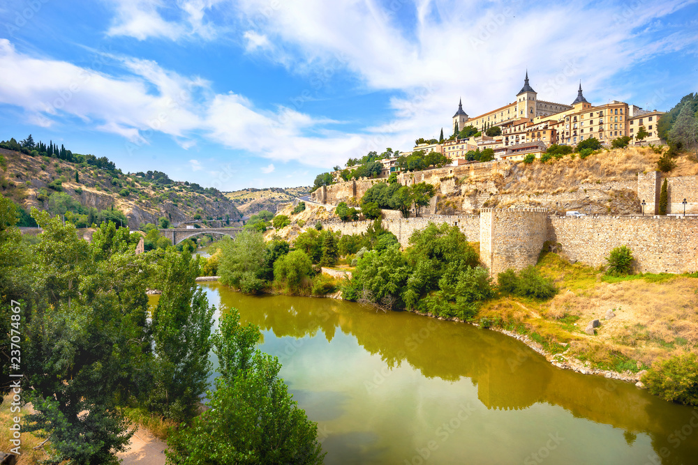 View of historic old town with Alcazar on Tagus River. Toledo, Spain