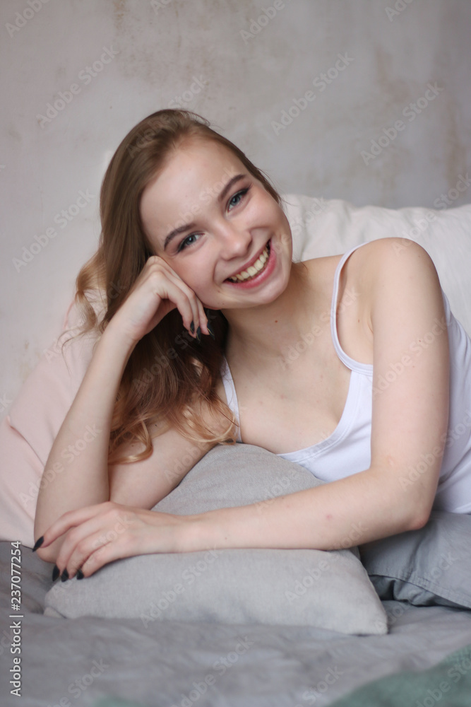 portrait young woman in bed portrait young woman in bed