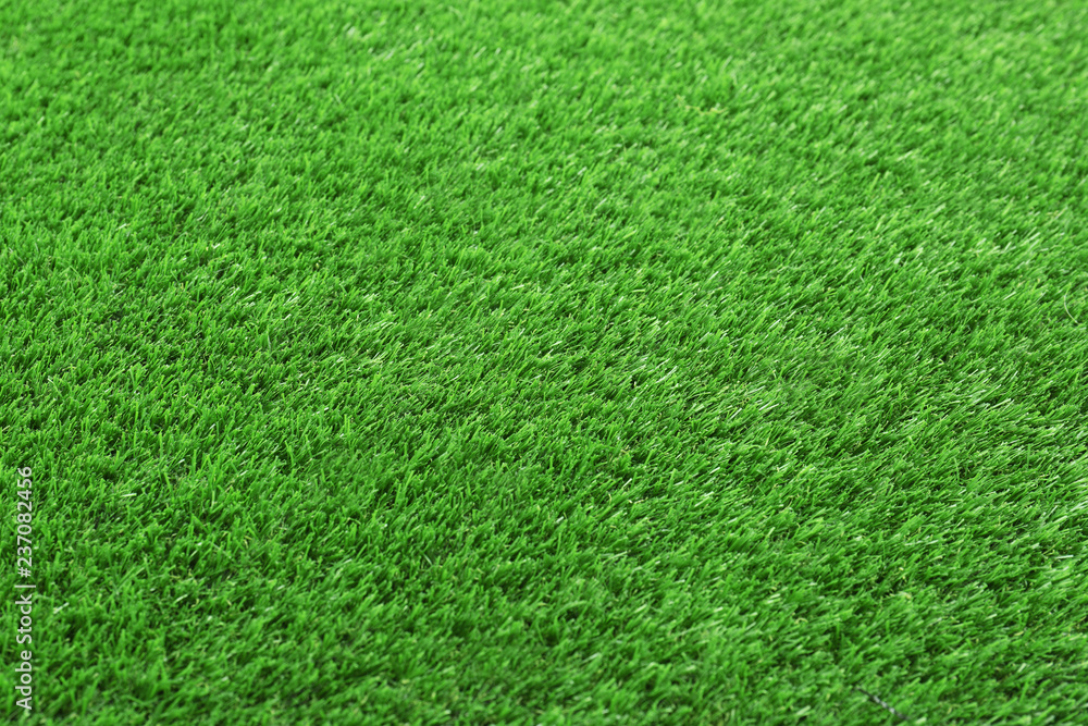 Artificial grass carpet as background, closeup. Exterior element Artificial grass carpet as background, closeup. Exterior element