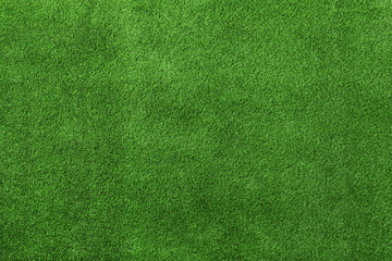 Artificial grass carpet as background, top view. Exterior element