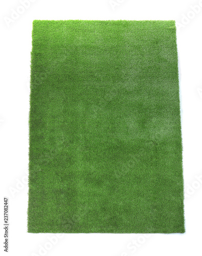 Artificial grass carpet on white background, top view. Exterior element