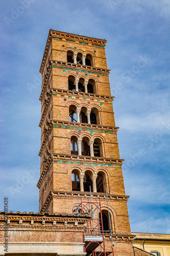 The church, the bell tower, and the liturgical fountain 