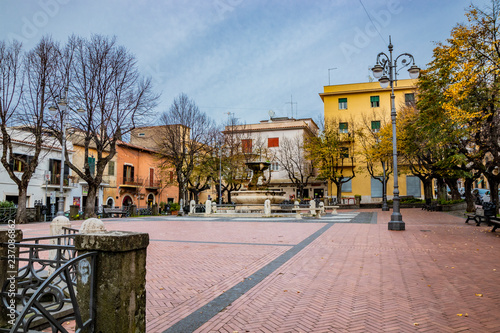 The main square of Grottaferrata, in the province of Rome, near Frascati, in an autumn, winter evening. In the Roman Castles.