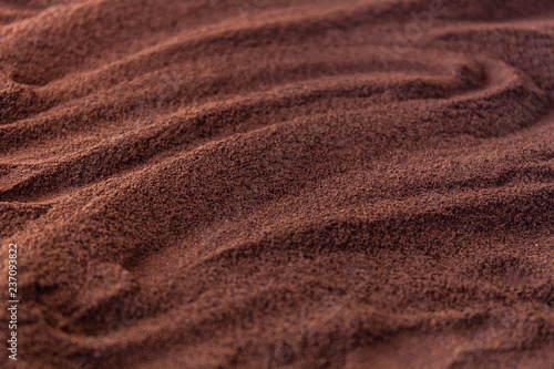 Ground coffee. Texture Background. Shallow depth of field