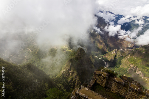 Machu Picchu maybe one of the most visited places in south america and it deserves it. Steep walls, impressive valleys and mountains surround the old city of the Inca Empire during a foggy morning © abriendomundo