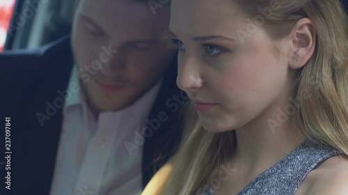 Embarrassed young lady stops man from kissing her in car, secret affair, romance