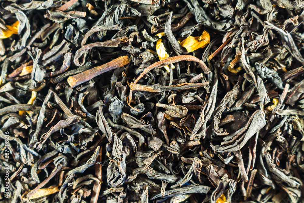 Black tea, dry leaves with flowers for all photos. Wallpaper Black tea, dry leaves with flowers for all photos. Wallpaper