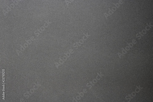 Texture of rough hard black steel panel, abstract background