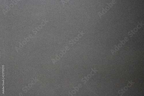 Texture of rough hard black steel panel, abstract background photo