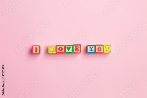 Message I love you spelled in wooden blocks. sign for relationships, romance, love and Valentines day,