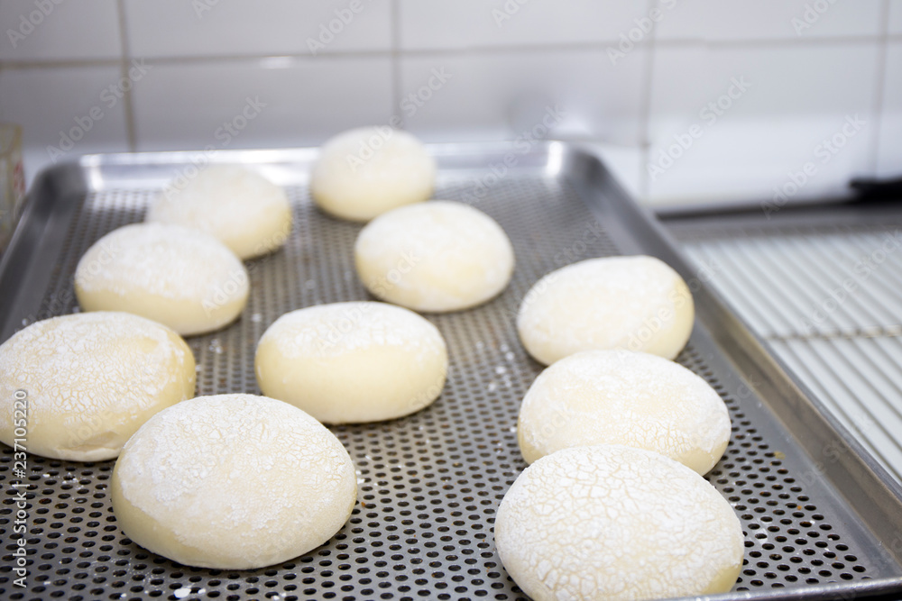 Baking doughnuts in a commercial kitchen Baking doughnuts in a commercial kitchen