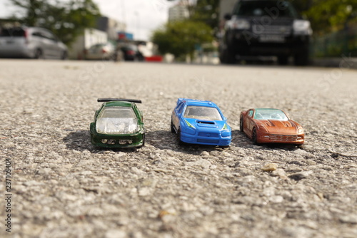 Toy cars on roads photo