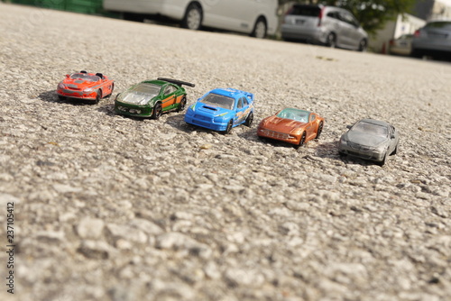 Toy cars on roads photo
