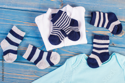 Clothes for little baby boy, extending family concept