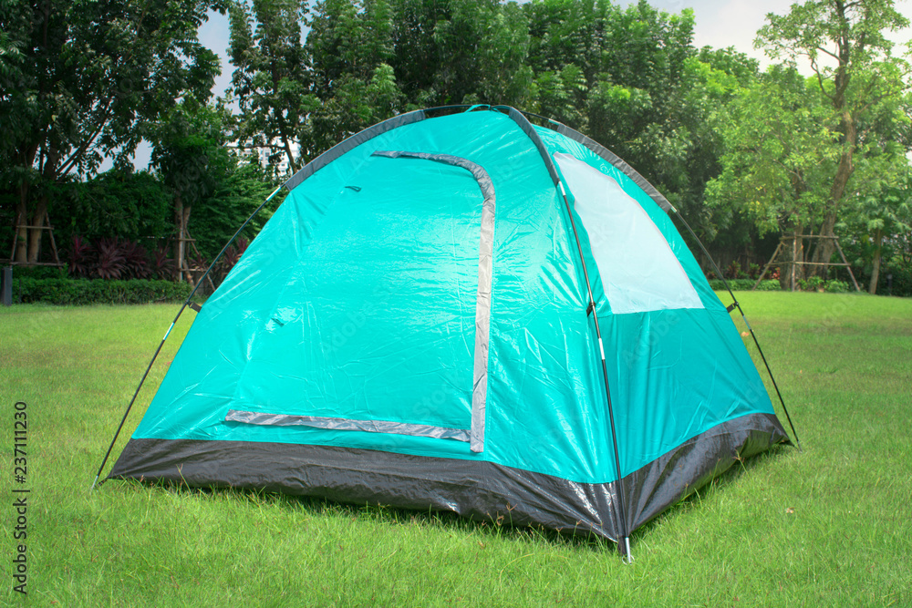 Light blue dome tent camping on green park outdoor